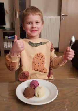 kid eating protein ice cream